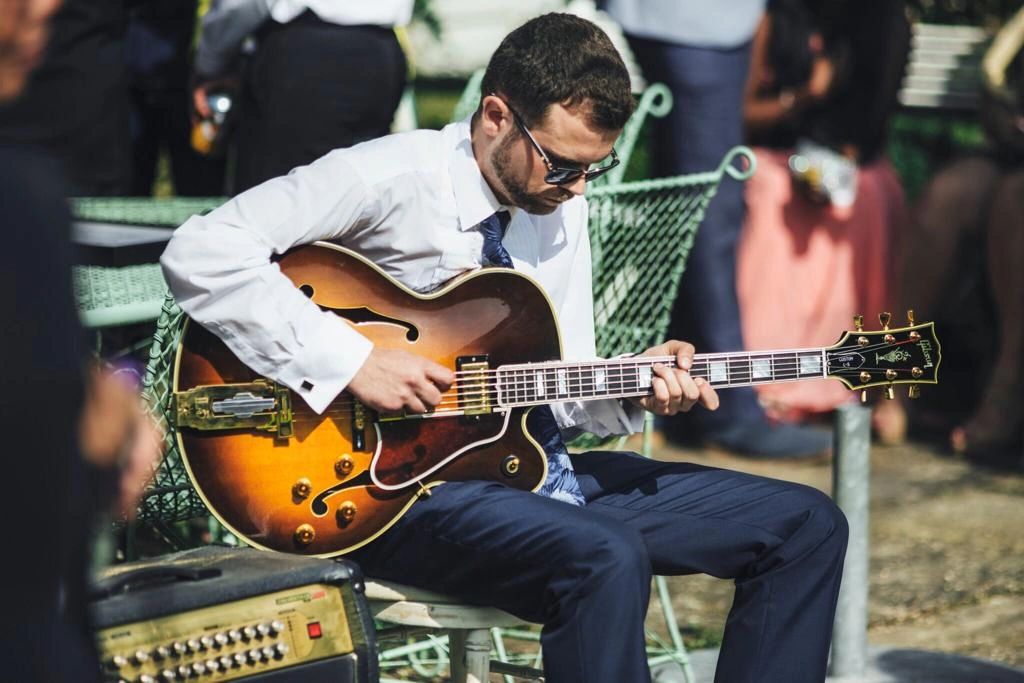 Live guitarist performing outdoor event professional guitar weddings guitar lessons Kings Langley