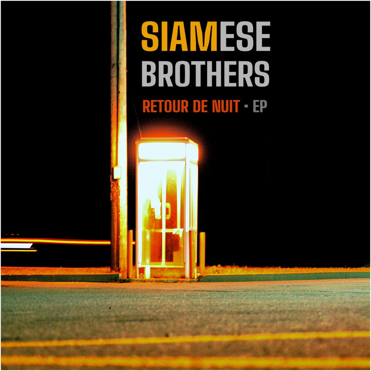 Album cover with illuminated phone booth at night.