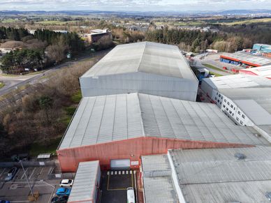 Aerial drone view of commercial buildings for roof inspection