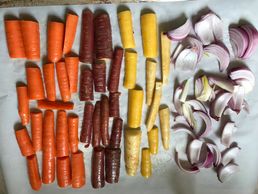 Pre-heat oven 400. Lightly coat vegetables with olive oil.  Roast until vegetables caramlize.