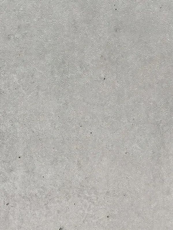 Close-up of a gray concrete surface with small imperfections.