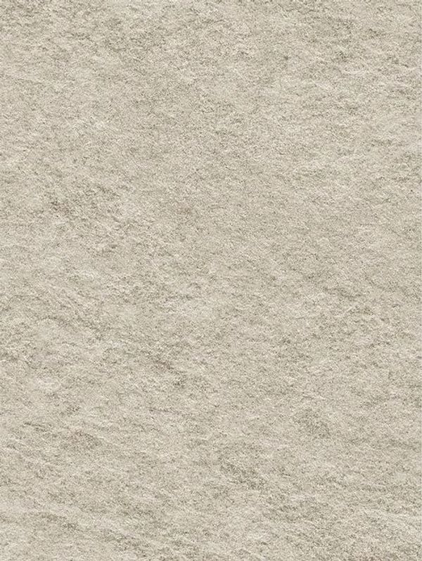 Close-up of a light gray textured stone surface.