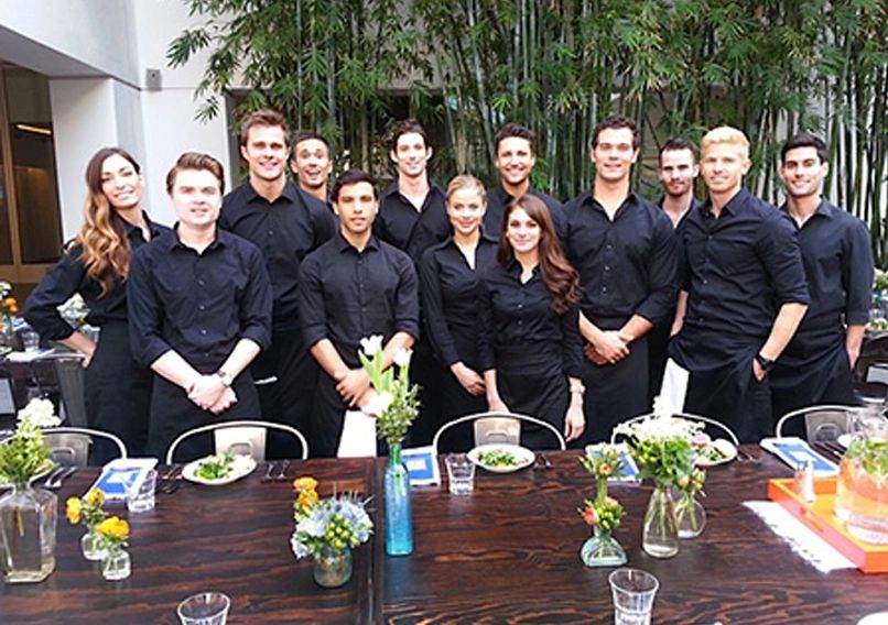 Team of servers in black uniforms - shared by Art of the Platter - Orlando