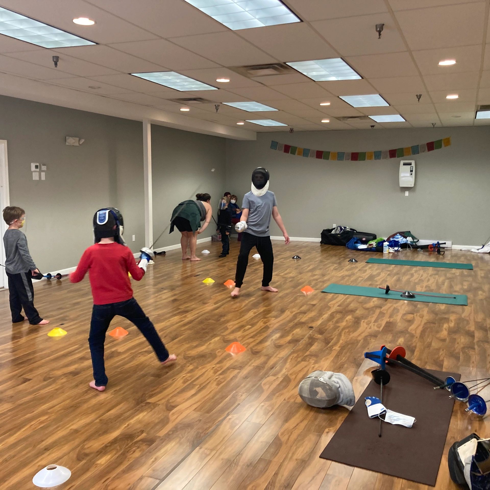 Group of people fencing