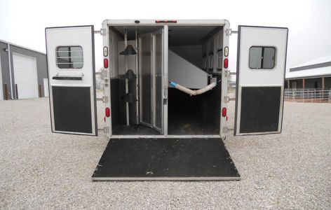 We have years of experience handling horses. We haul in an aluminum GN LQ horse trailer.  