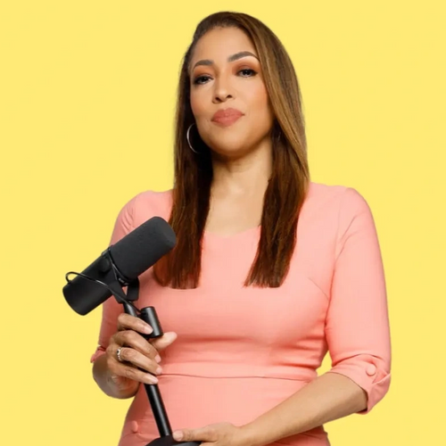 Kontji Anthony holding a microphone.