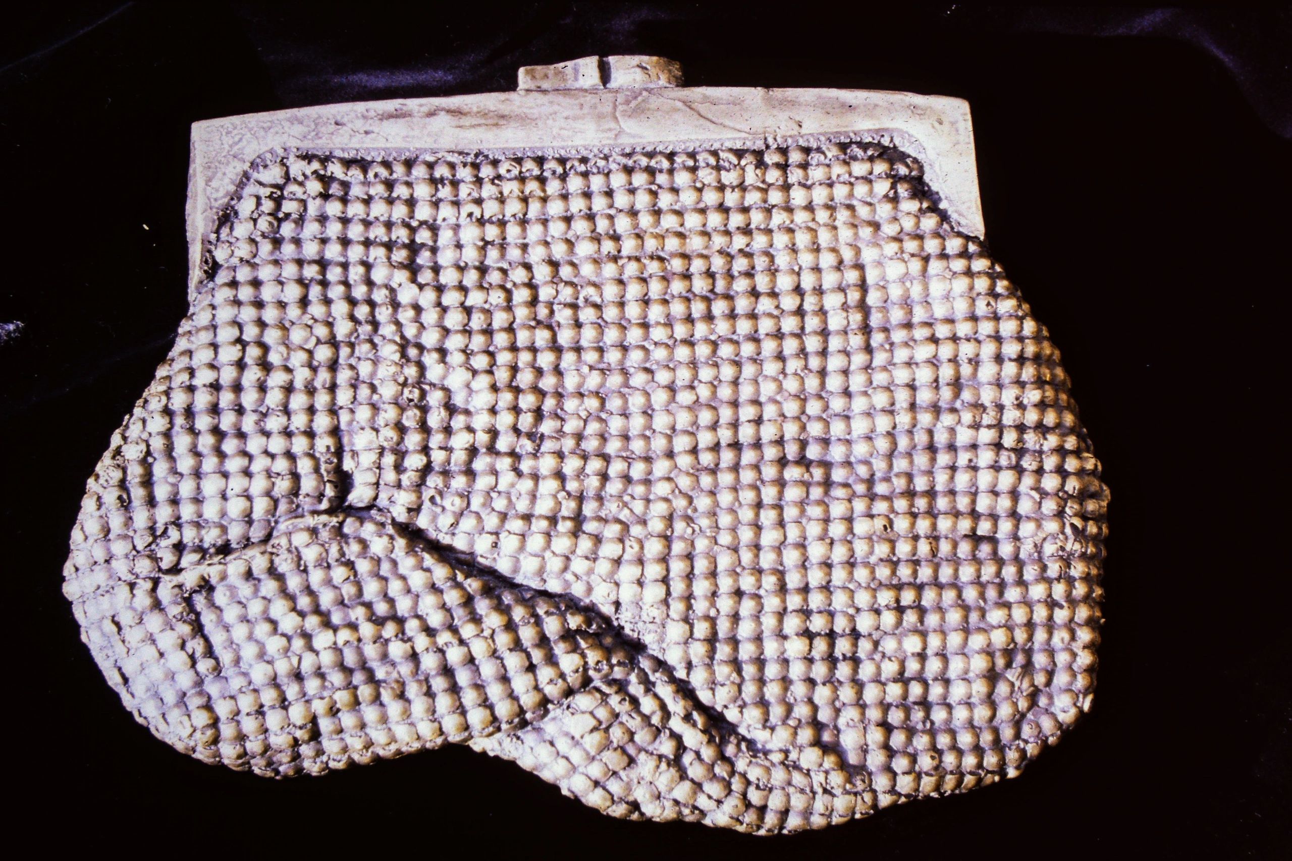 Bronze sculpture handbag footpath art Glowmesh Brunswick  
Alice Nixon