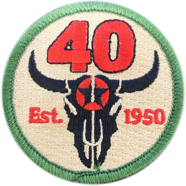 Round patch with a bull skull, "40", and "Est. 1950" text.