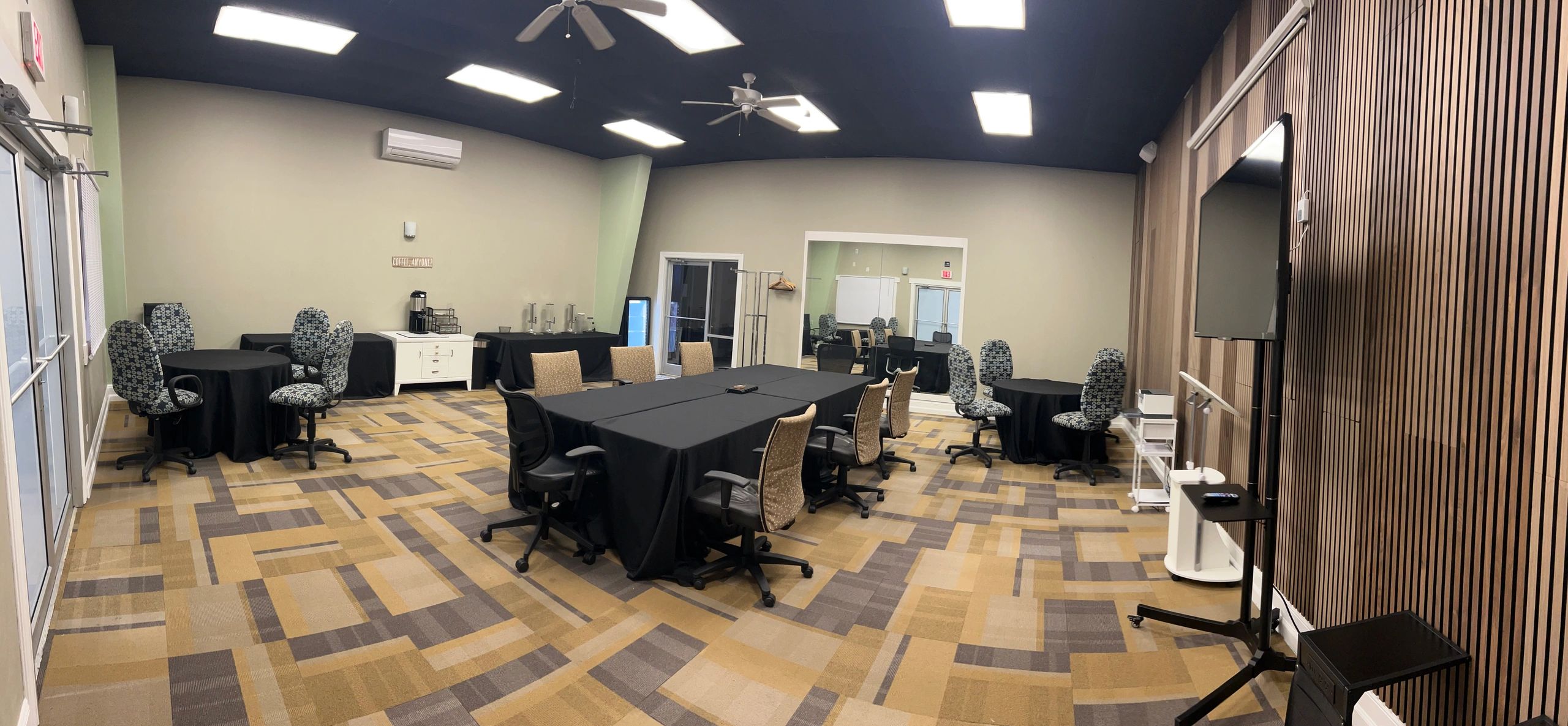 Configuration: Boardroom Table with 2-round side tables for breakdown team meetings.