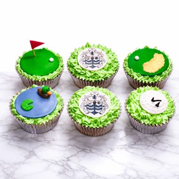 Golf-themed cupcakes with detailed edible decorations and green frosting.