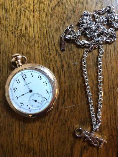 .925 Sterling Silver Ofast Necklace next to a classic Waltham Pocket Watch