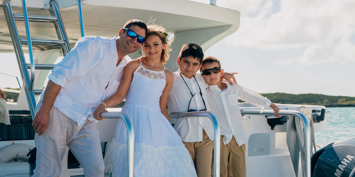 Captain Scott and family on a catamaran in the Bahamas