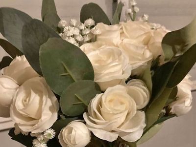 Neutral bridal bouquet.  Contact us for a consultation.  We love all types of parties.  