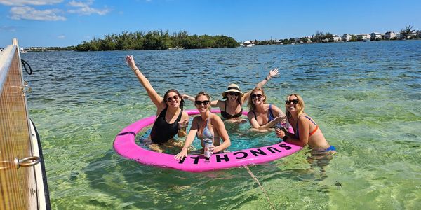 bachelorettes on a 2 hr mini sandbar cruise with tiki boat adventures Key West