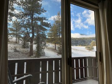looking out the slider doors/balcony from the master bedroom