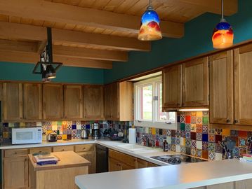 kitchen with stove, sink, and microwave