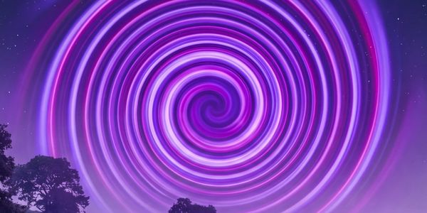 Purple spiral vortex in a night sky above silhouetted trees.