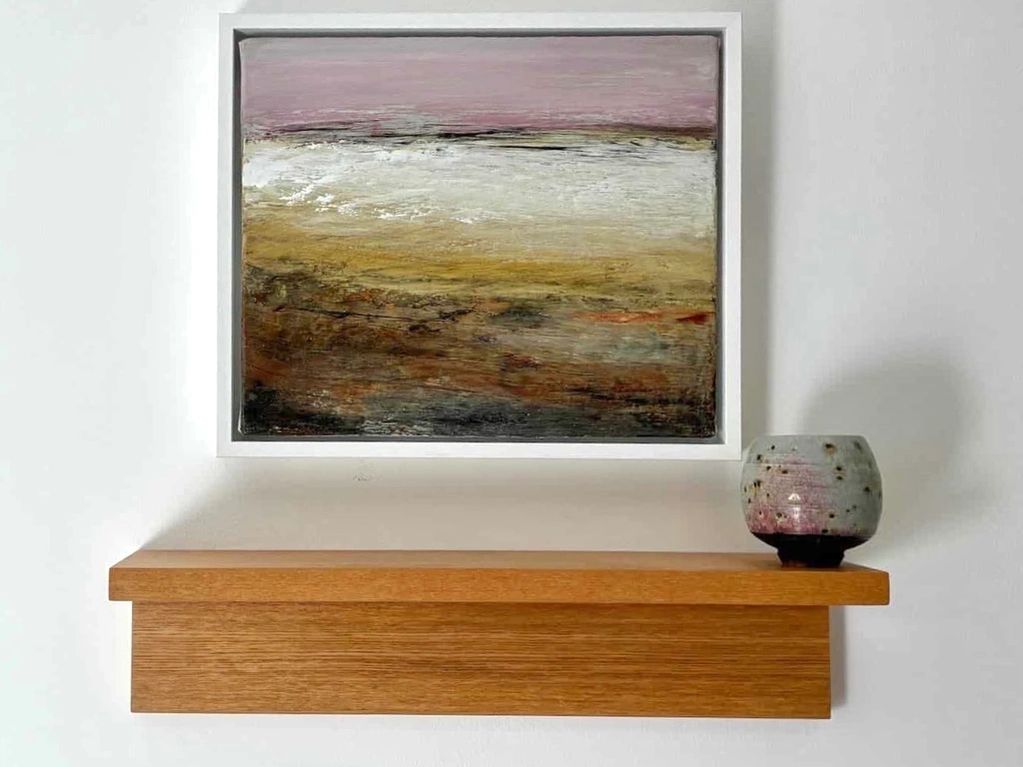a small colourful painting of the sunset, warm colours 