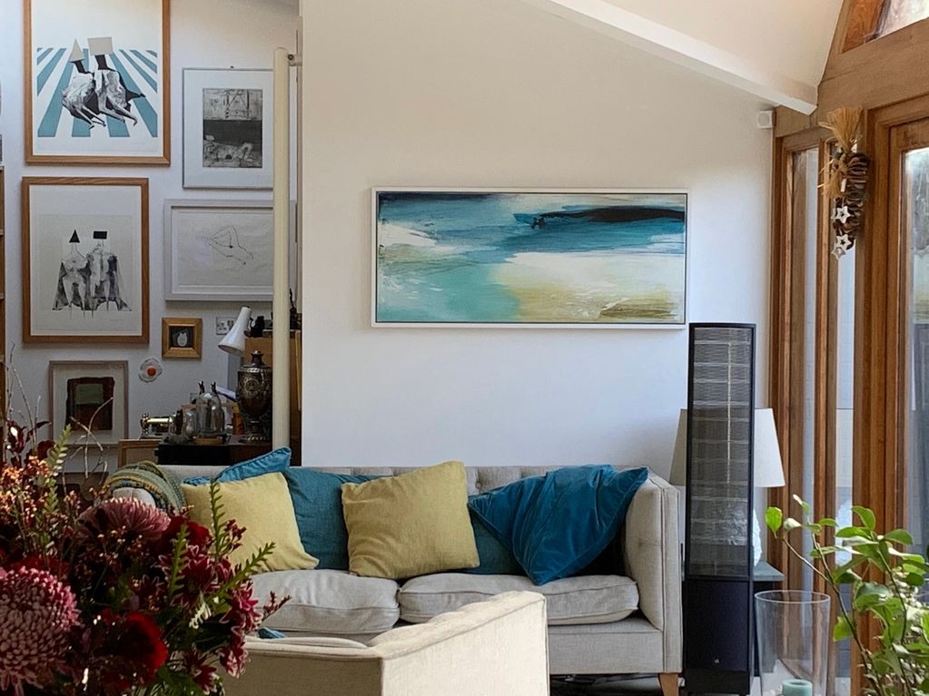 A sea inspired painting on canvas in a beautiful livingroom