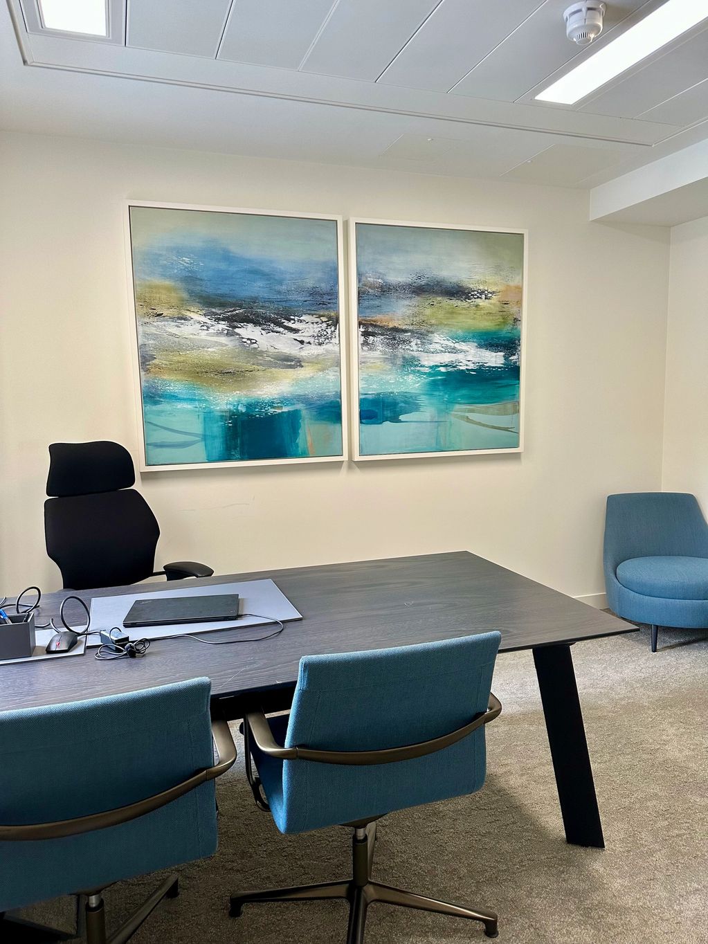 a large diptych in an office setting, creating calm 