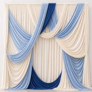 Elegant draped curtains in blue and cream tones creating a sophisticated backdrop.