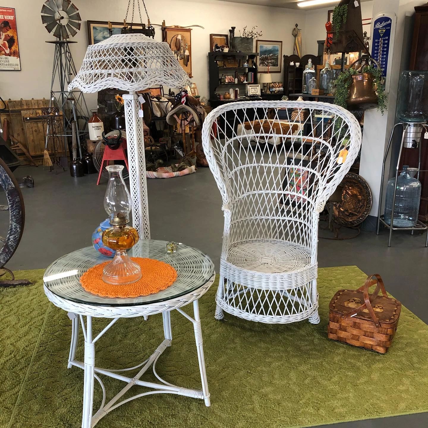 Vintage Peacock chair and French Eiffel Tower Wicker floor lamp.