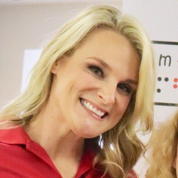 Dr. Megan Martin smiles at a career fest.