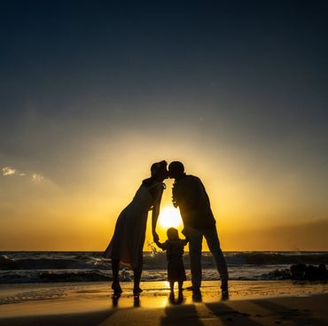 family looking into the sun