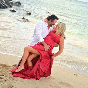 Couple being romantic at Maui beach.