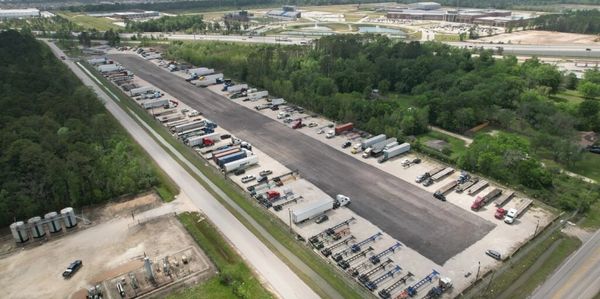 Tractor truck and trailer drop site. Industrial outdoor storage. 