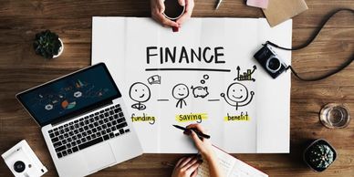 Illustration of finance concepts with drawings and a laptop.