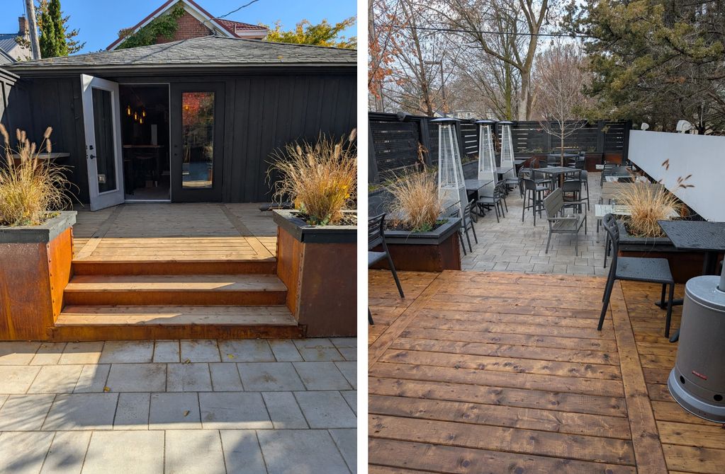 Outdoor patio with wooden steps, planters, and seating area with heaters.