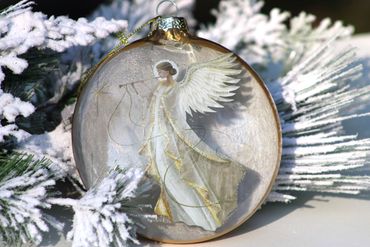 Raz Holy Family and Angel  glass Christmas ornaments to celebrate the true meaning of Christmas.  