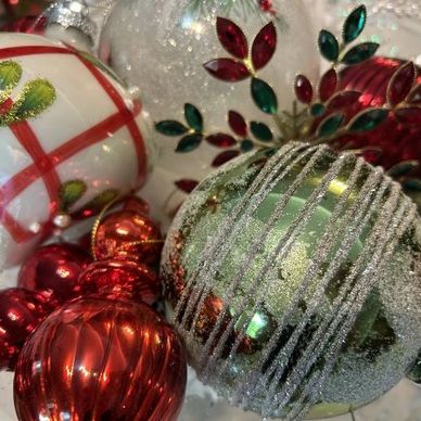 A curated luxury collection of glass Christmas ornaments for your Christmas tree.
