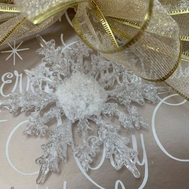 Glass snowflake ornaments and delicate shimmering glass icicles for your holiday tree.
