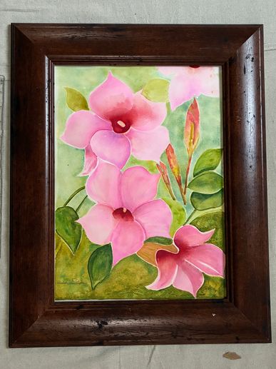 Framed watercolor painting of pink flowers.