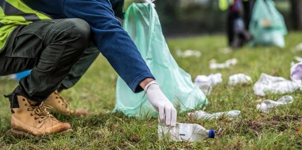 picking up rubbish after festival