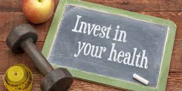 Chalkboard displaying the words invest in your health.