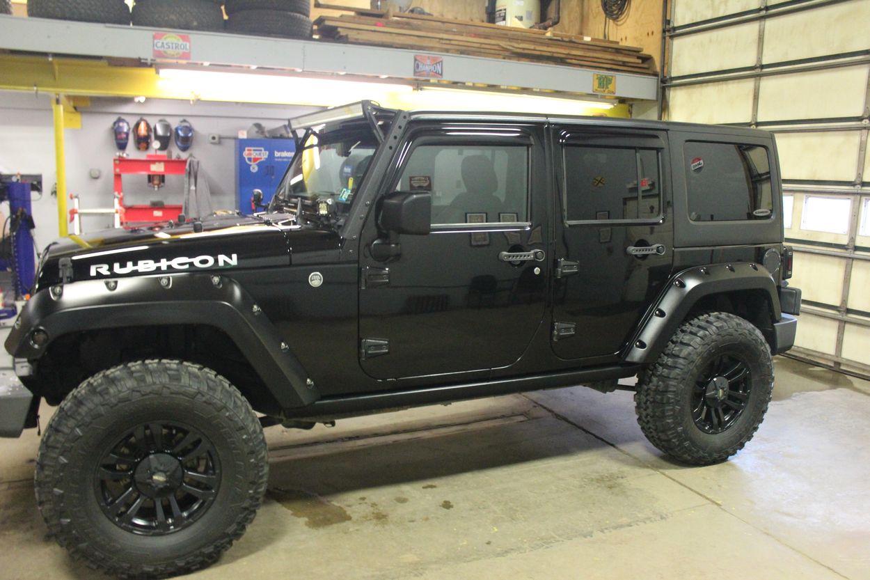 2013 Jeep Wrangler Unlimited Rubicon.   3 inch lift. Sitting on 35's. Adams Graphene Ceramic Coating