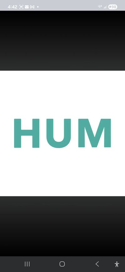 The word 'HUM' in teal on a white background.