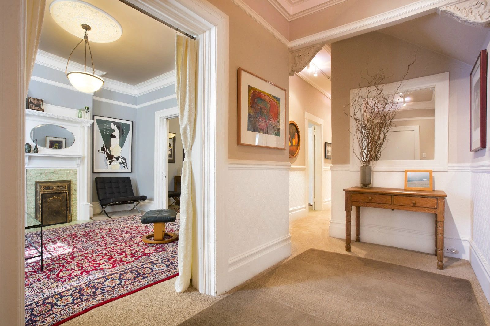 Elegant entry hall sets the tone. Origianl artwork at YourHomeInSanFrancisco