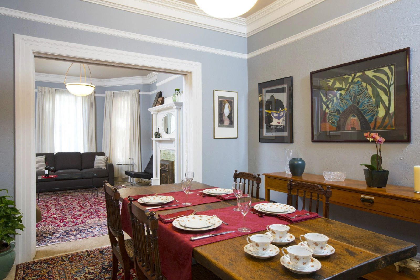 Formal dining room. Quality china, flatware and stemware. Custom-made runners and napkins. 