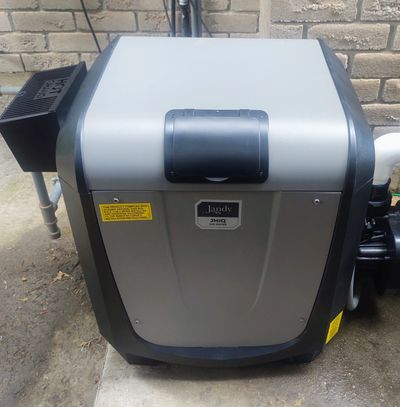 Exterior view of a Jandy JXi pool heater showing the VersaFlo bypass in Maple, Vaughan.