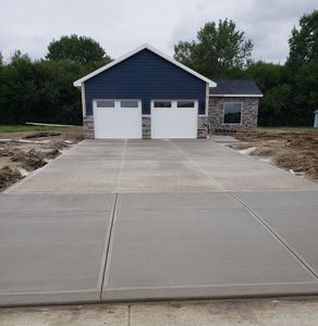 Concrete driveway and concrete apron
