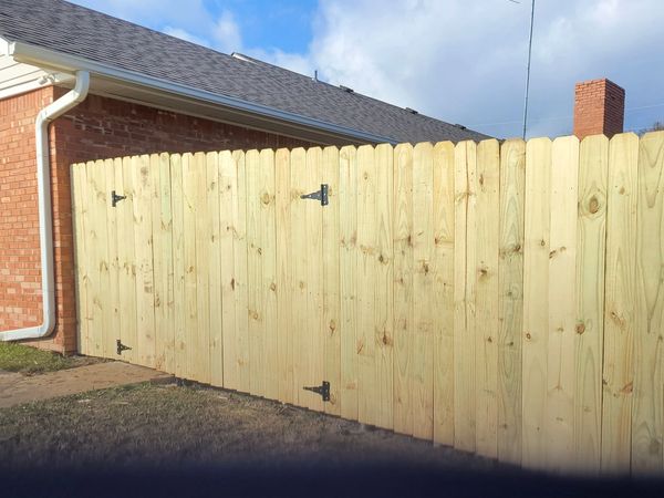 New privacy fence with gate. 