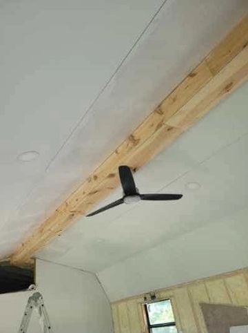 Wet paint on tiny house ceiling. 