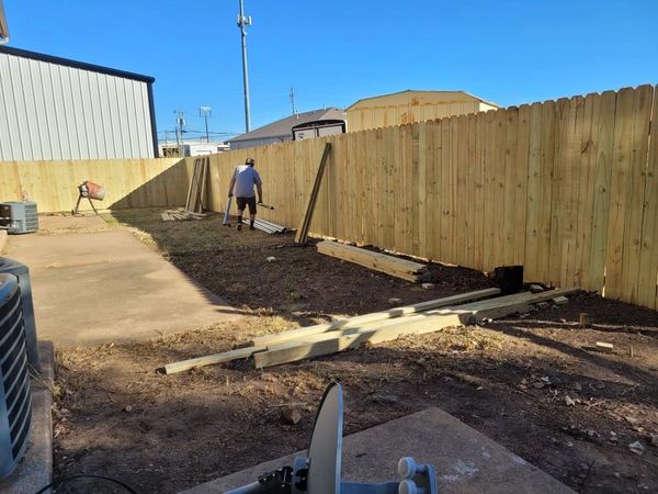 Installing 300+ feet of privacy fence for 7-unit townhouses. 