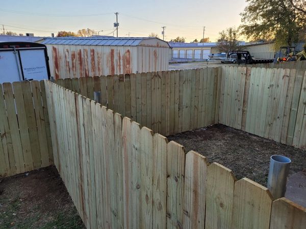 Finishing up 300+ feet of privacy fence for 7-unit townhouses. 