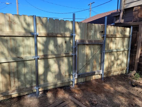 New privacy fence with gate almost complete. 