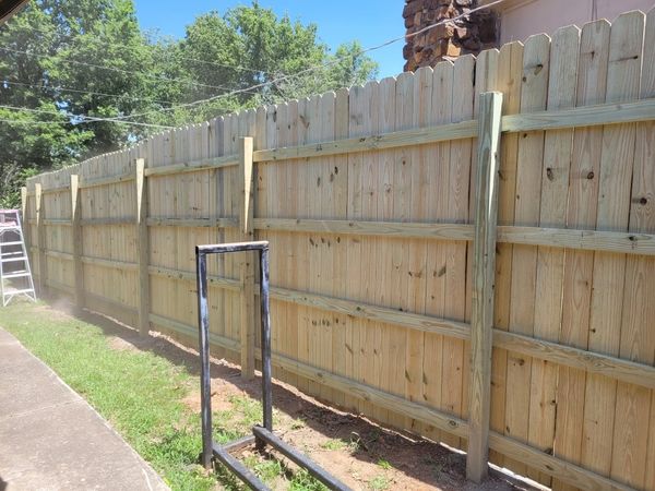 New privacy fence installation in Sand Springs, OK. 